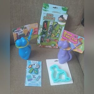 5: Dinosaur- 2 sippys,sandwich cutter, croc charms and bracelets charm set